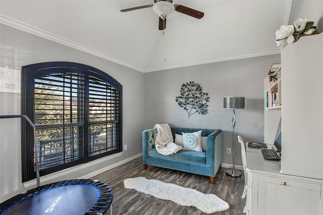 living area with crown molding, dark hardwood / wood-style flooring, and ceiling fan