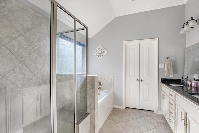 bathroom featuring tile patterned flooring, crown molding, lofted ceiling, shower with separate bathtub, and vanity