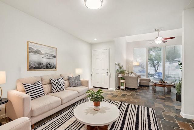 living room featuring ceiling fan