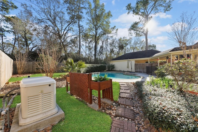 view of yard with a fenced in pool