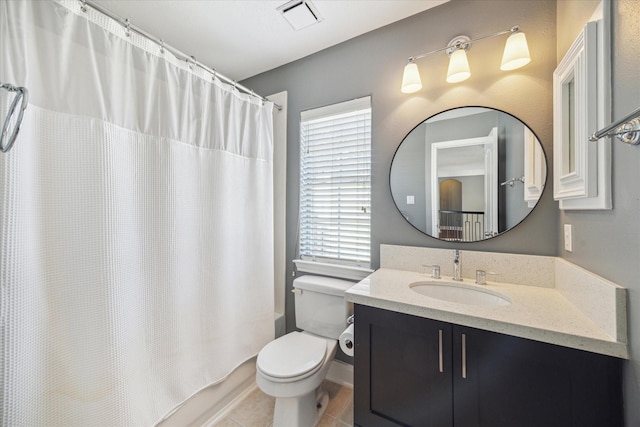 full bathroom with vanity, a wealth of natural light, shower / bath combo with shower curtain, and toilet