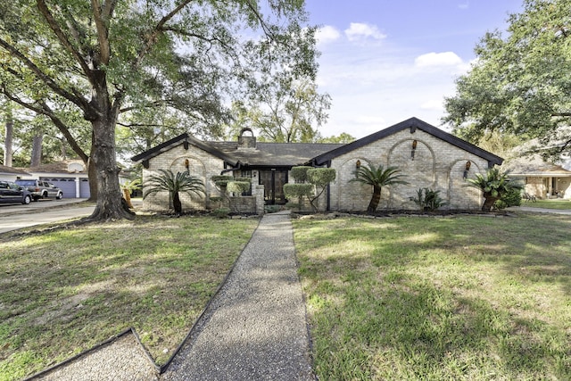 view of front of house with a front lawn