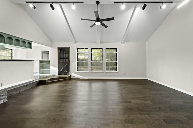 unfurnished living room with dark hardwood / wood-style floors, ceiling fan, and lofted ceiling with beams