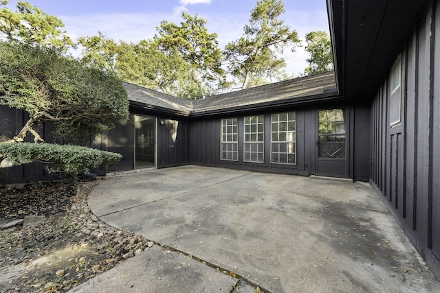 property entrance with a patio area