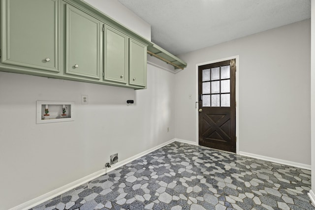 clothes washing area featuring cabinets, washer hookup, and hookup for an electric dryer