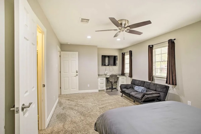 carpeted bedroom featuring ceiling fan