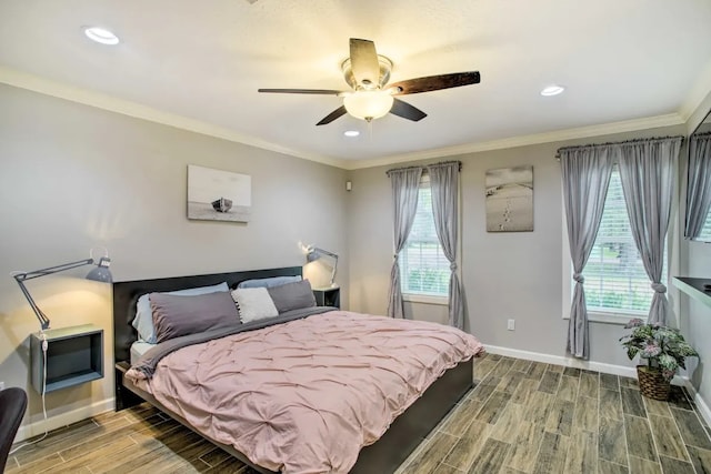 bedroom featuring ceiling fan and ornamental molding