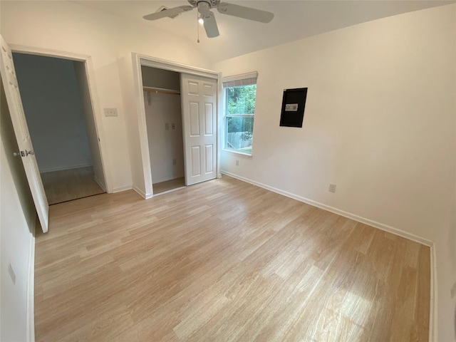 unfurnished bedroom featuring light wood-type flooring, a closet, and ceiling fan