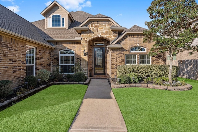 view of front of property with a front lawn