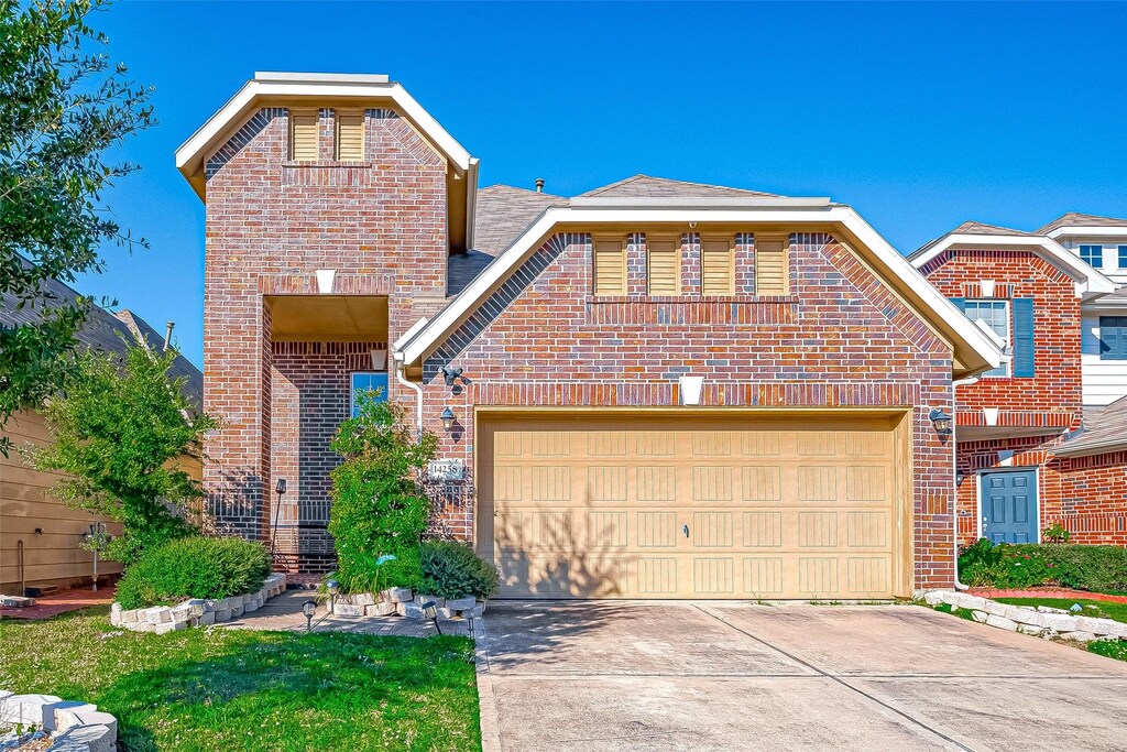 view of front property with a garage