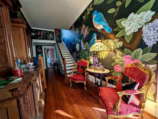 sitting room featuring dark hardwood / wood-style flooring and ornamental molding