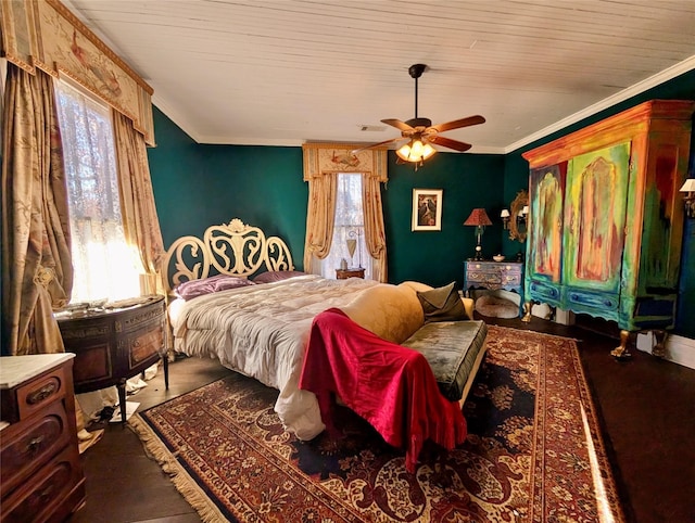 bedroom with ceiling fan and crown molding