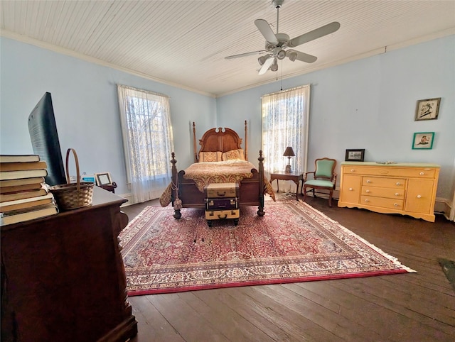 bedroom featuring multiple windows, ceiling fan, and crown molding