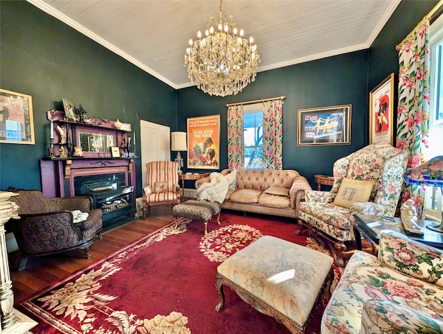 living room featuring a chandelier, ornamental molding, and dark wood-type flooring