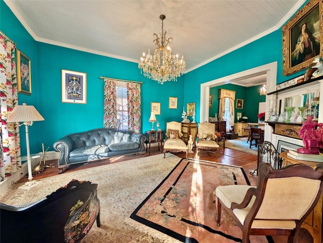 living room with crown molding, wood-type flooring, and an inviting chandelier