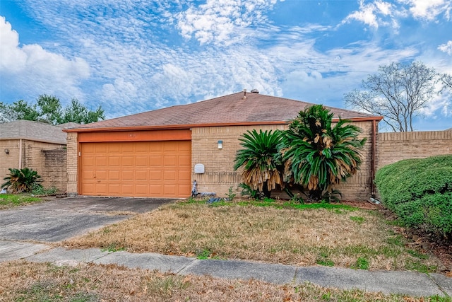 view of property exterior with a garage