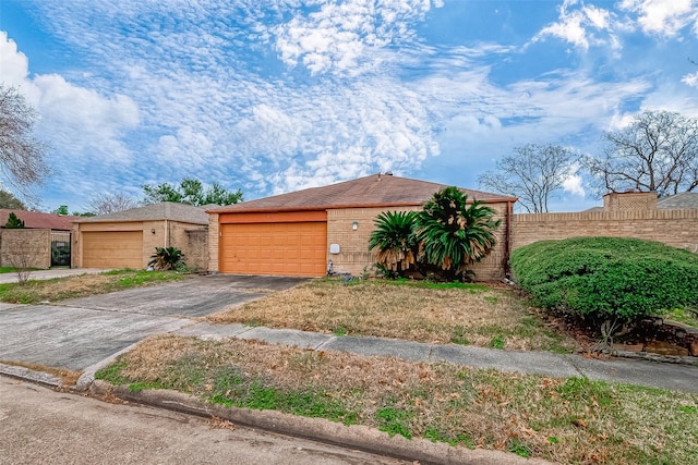 ranch-style home with a garage