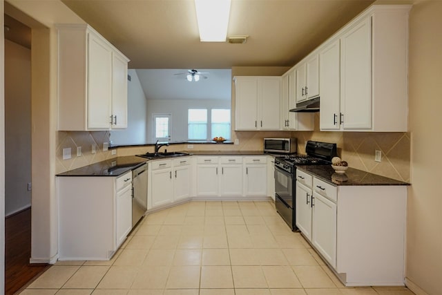 kitchen featuring backsplash, ceiling fan, stainless steel appliances, and white cabinets