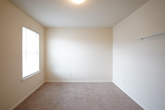 view of carpeted spare room