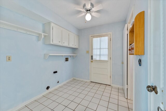 washroom featuring ceiling fan, electric dryer hookup, cabinets, washer hookup, and light tile patterned flooring