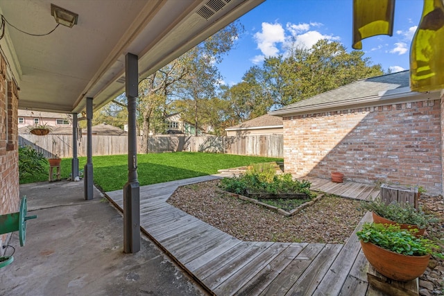 view of yard with a deck