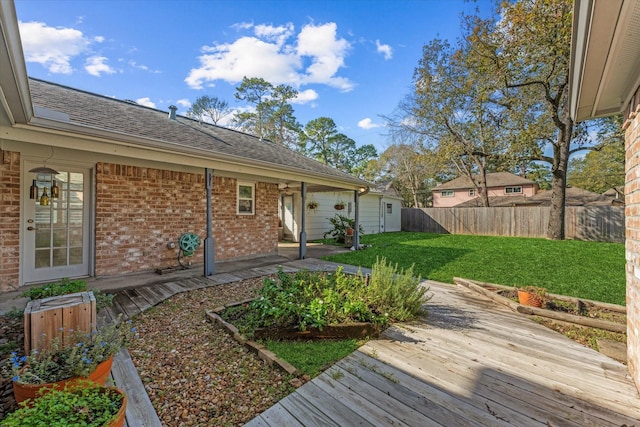 view of yard featuring a deck