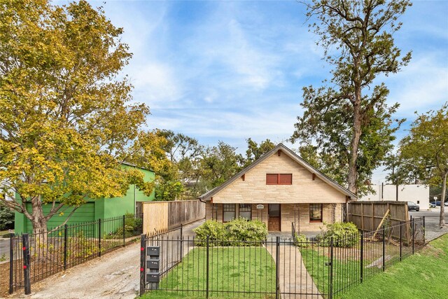 bungalow with a front lawn