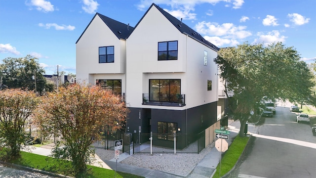 view of front of home with a balcony