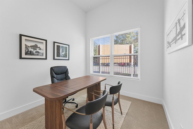 home office with light colored carpet