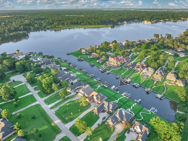 birds eye view of property featuring a water view