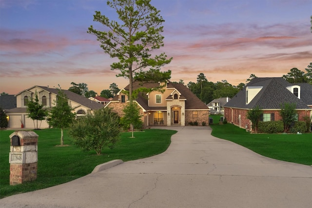 view of front of home featuring a yard