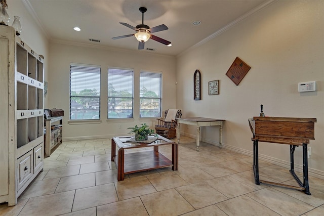 living area with light tile patterned floors, ceiling fan, and crown molding