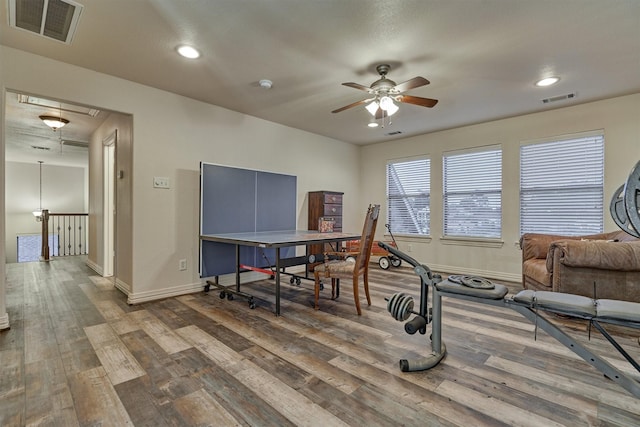 interior space featuring ceiling fan and wood-type flooring