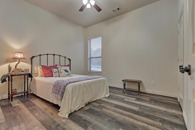 bedroom featuring vaulted ceiling, ceiling fan, and dark wood-type flooring