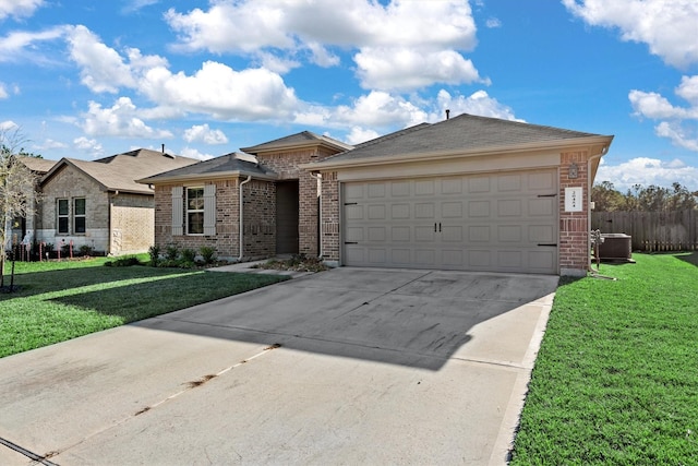 ranch-style house featuring a garage, central air condition unit, and a front lawn