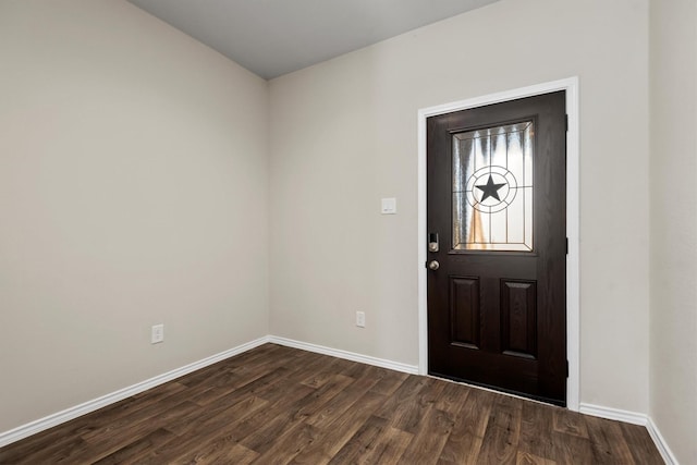 entrance foyer with dark hardwood / wood-style floors