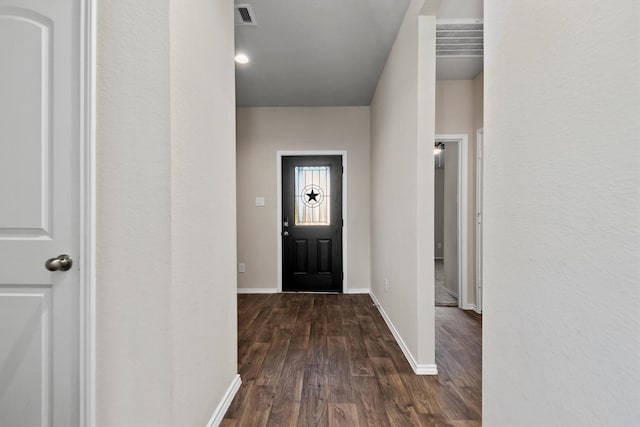 foyer entrance with dark hardwood / wood-style flooring