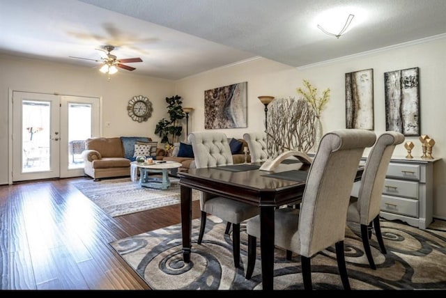 dining room featuring french doors, crown molding, dark hardwood / wood-style floors, ceiling fan, and a textured ceiling