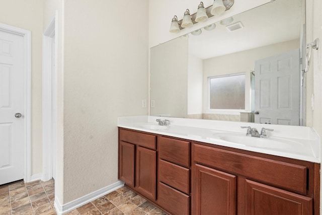 bathroom featuring vanity