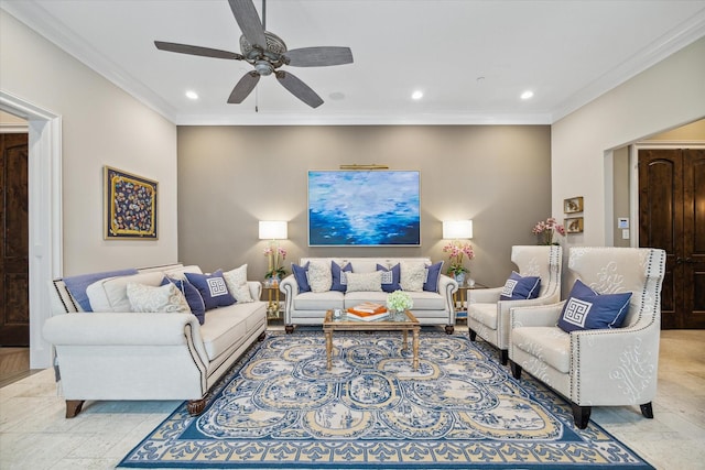 living room with ceiling fan and ornamental molding