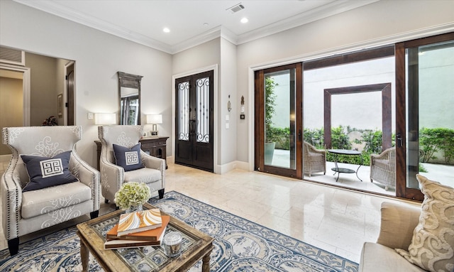 living room featuring crown molding and french doors