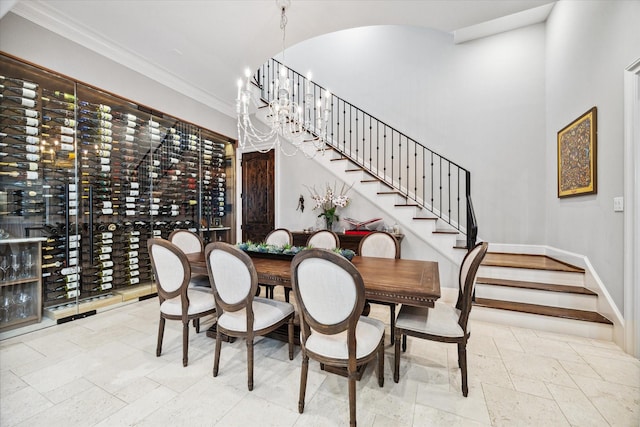 interior space featuring a notable chandelier and crown molding