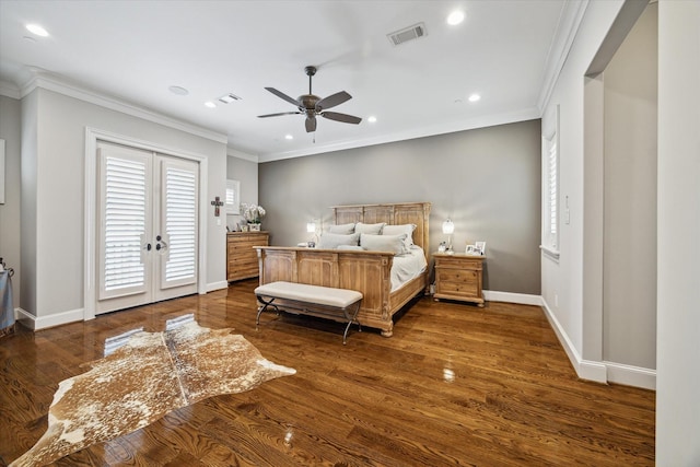 bedroom with ceiling fan, dark hardwood / wood-style flooring, ornamental molding, and french doors