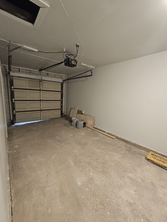 garage featuring a garage door opener