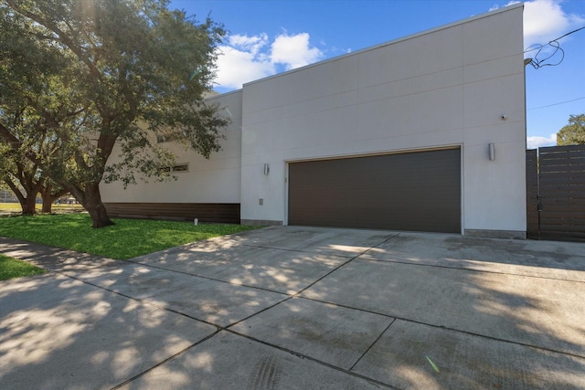 view of front of property with a front yard and fence