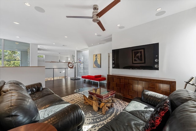 living room with ceiling fan, visible vents, wood finished floors, and recessed lighting