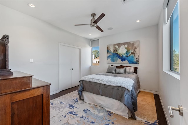 bedroom featuring ceiling fan, a closet, baseboards, and recessed lighting