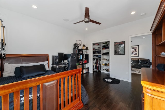 bedroom with a ceiling fan, dark wood-type flooring, and recessed lighting