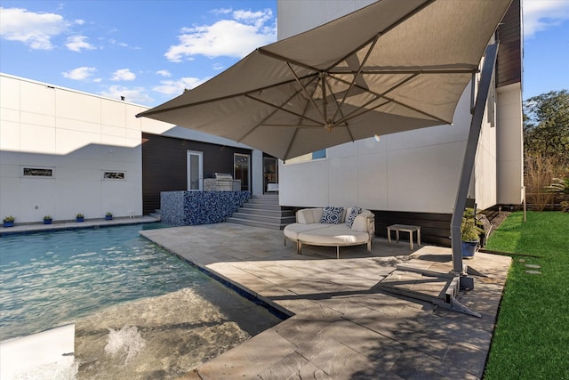 exterior space with an outdoor pool and a patio