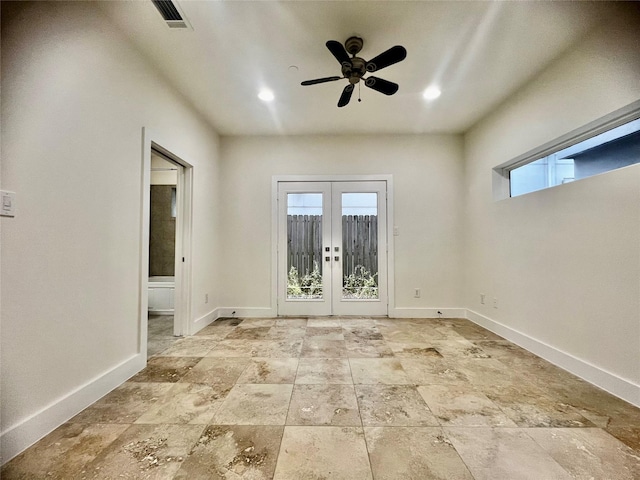 interior space featuring french doors and ceiling fan